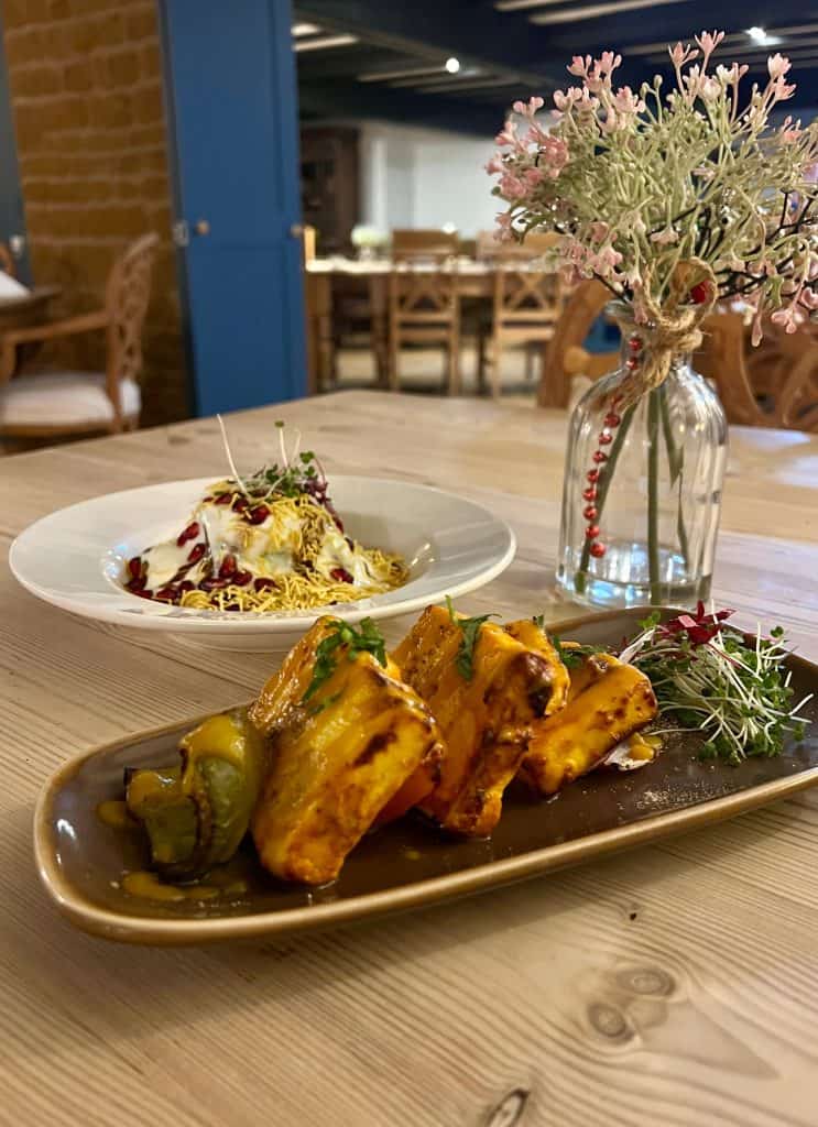 Indian food & rooms Marquess of Exeter: mango paneer shashlik with samosa chat with in background