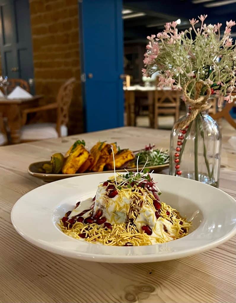 Indian food & rooms Marquess of Exeter: samosa chat with mango paneer shashlik in background