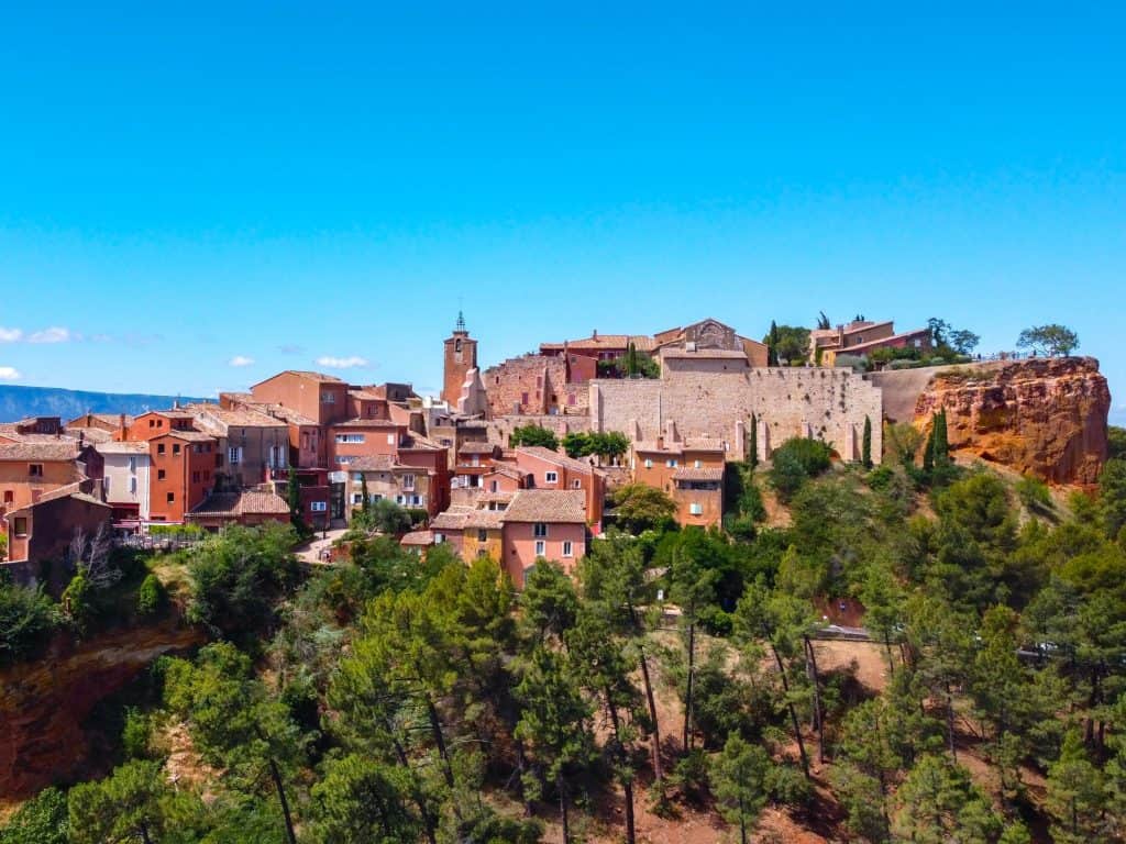 Beautiful villages to visit in Provence: panoramic village view of Rousillon