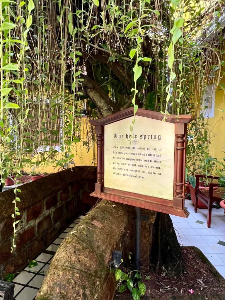 A close-up of The sign of the Jewish ladies bathing in Hotel Forte Kochi