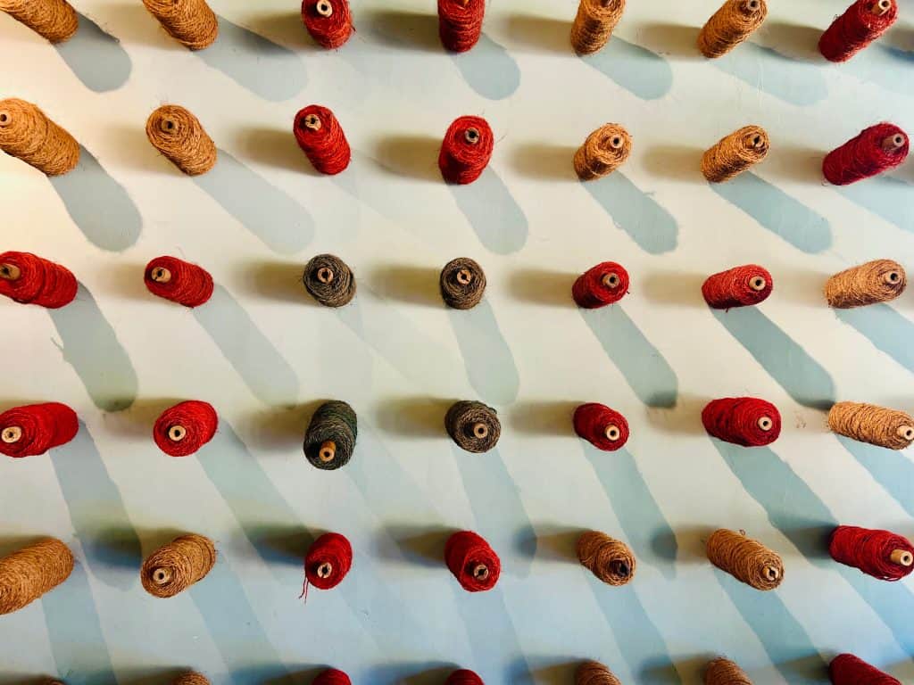 Coloured coir displayed on wall of International Coir Museum