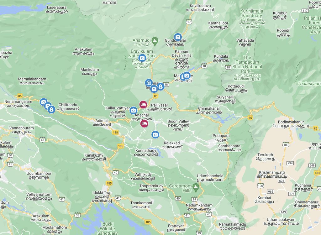 Google Map of Munnar with all attraction locations as well as hotels. The map is green adn cream coloured to represent land and high ground with blue patches to represent lakes.