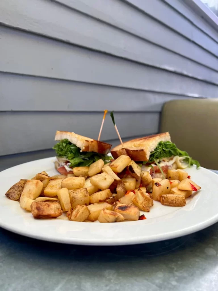 Breakfast Sandwich with potatoes at The Cottage, La Jolla