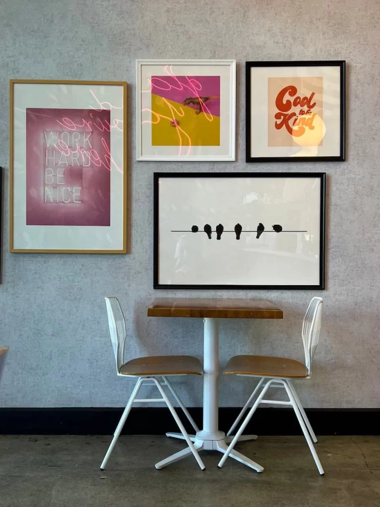 Interiors with bright wall art at Parakeet Cafe, Coronado, San Diego