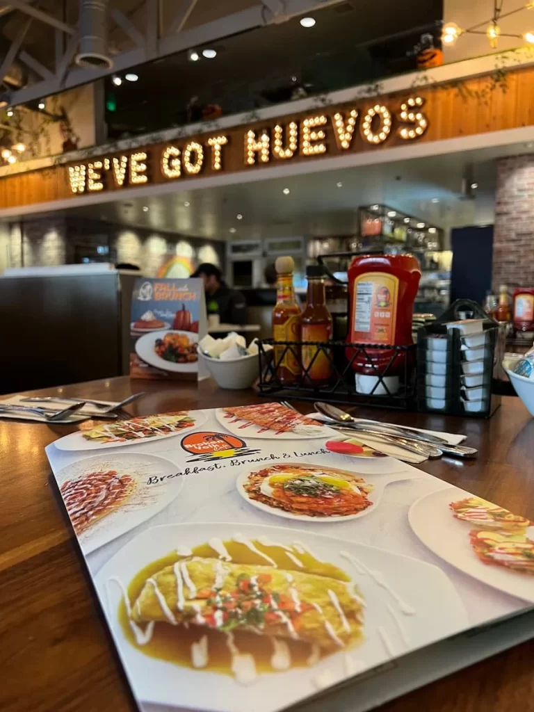 Menu and interiors of Broken Yolk San Diegoa