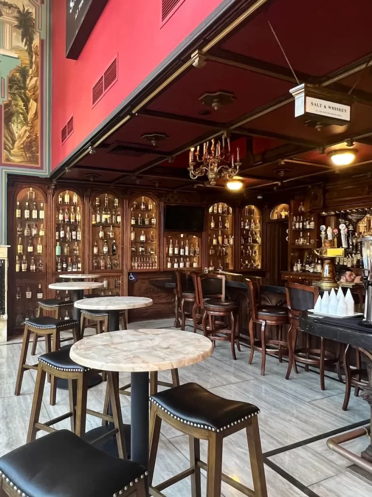 Dark wood interiors of the Whiskey & Salt bar at The Horton Grand Hotel, San Diego