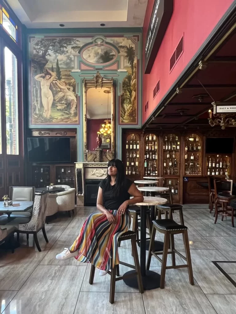 Bejal sitting in the Whiskey & Salt bar at The Horton Grand Hotel, San Diego