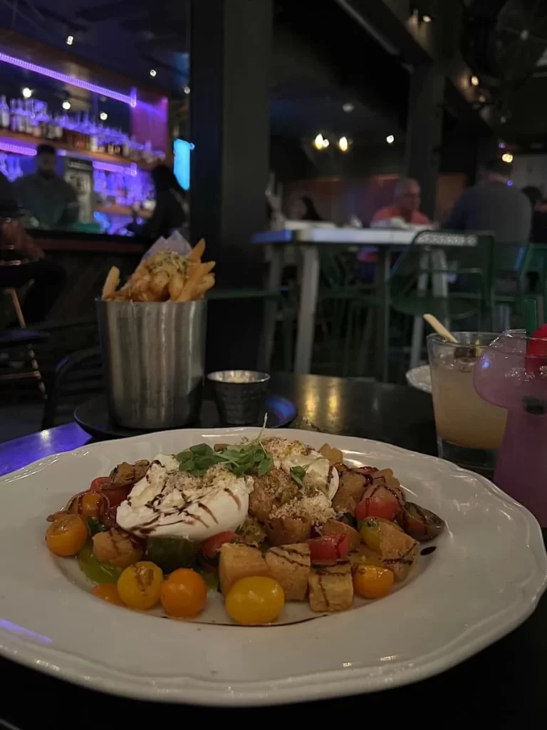 heirloom tomato Burrata with the Idaho white truffle fries at Rustic Root, San Diego