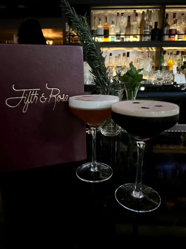 Espresso Martini and Amaretoo Sour next to Fifth & Rose menu, San Diego