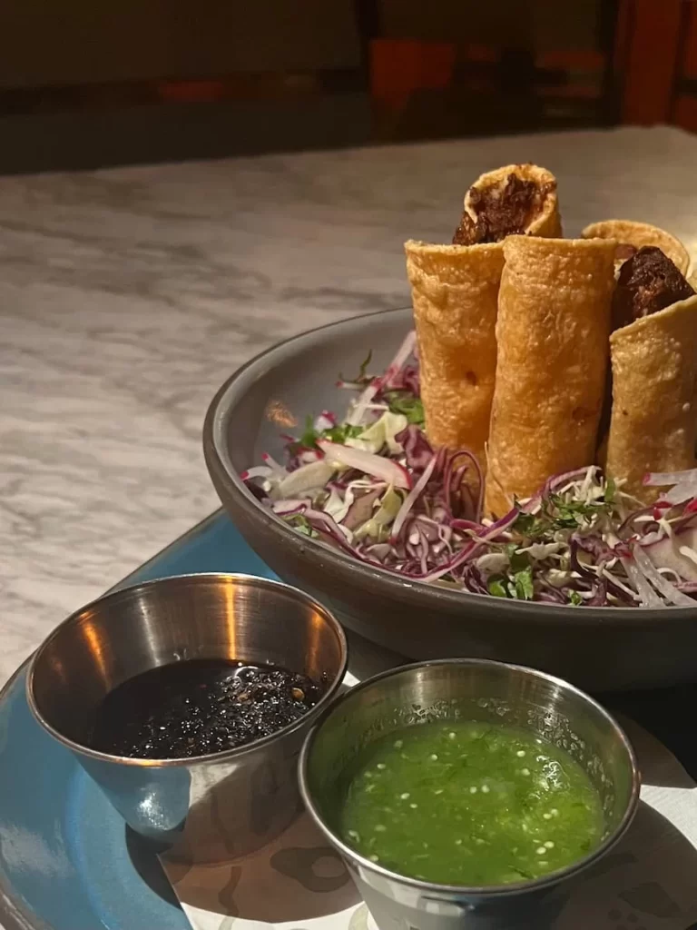 Grilled vegetables and fried taco shells with guacamole and sauves at Puesta, San Diego