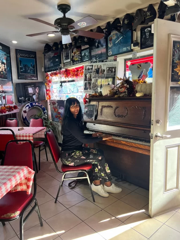 Bejal sat at piano in the Kansas City Barbecue Bar, San Diego