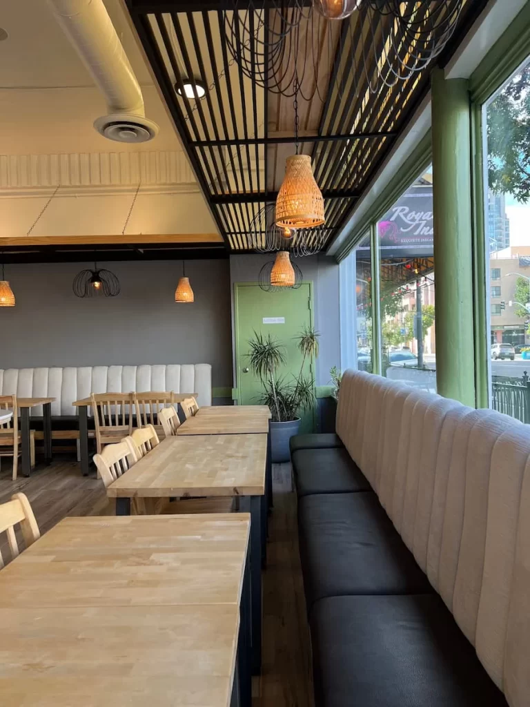 The sage green and cream interiors at Tiger Cafe, San Diego