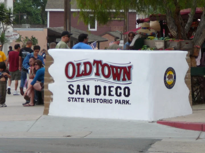 San Diego Old Town Sign with crowds in the background.