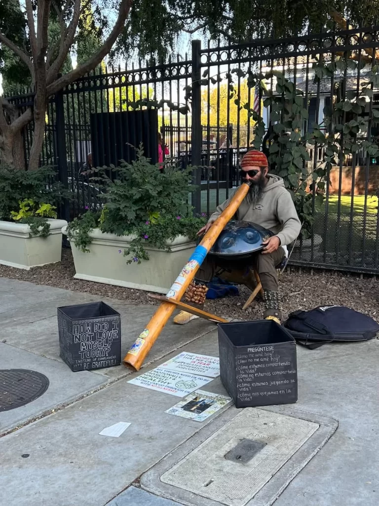 Didgeridoo player at Little Italy Mercato San Diego