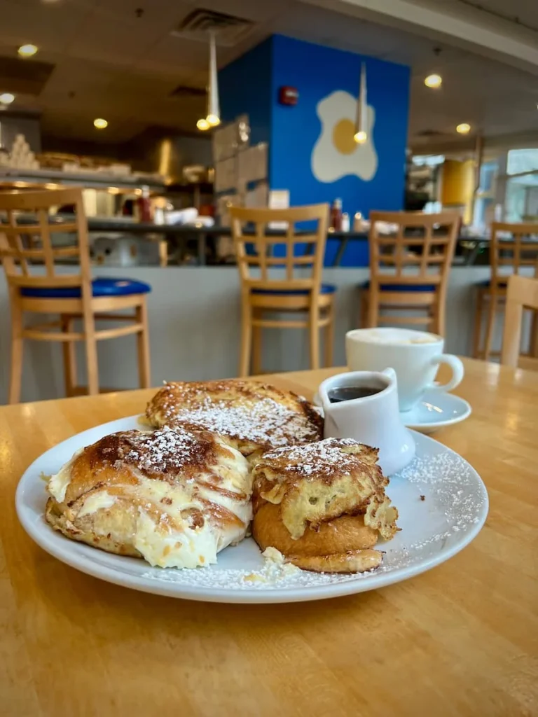 The background has high chairs and a counter.The background has high chairs and a counter