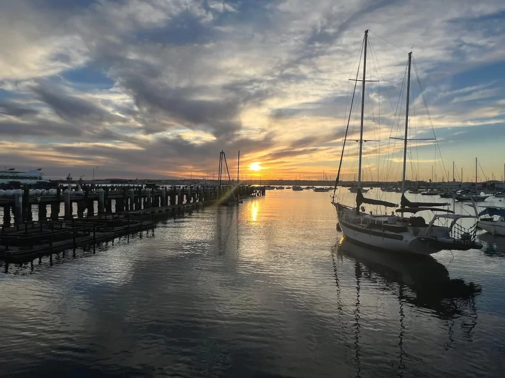 Visitors Guide to San Diego: Sunset over the yachts and harbour front at the The Embarcadero, San Diego