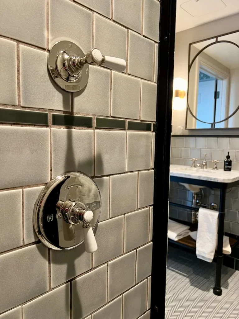 Shower view looking out to bathroom at The Hoxton, Chicago