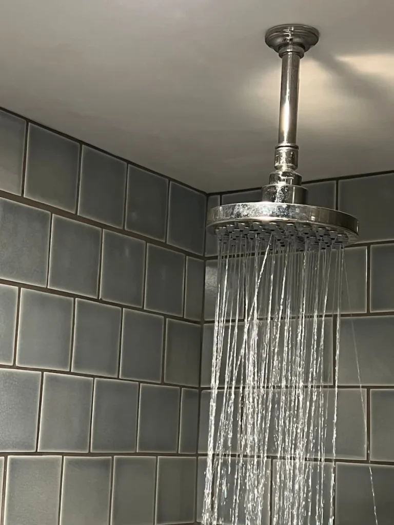 The rain shower head in the guest rooms at The Hoxton, Chicago