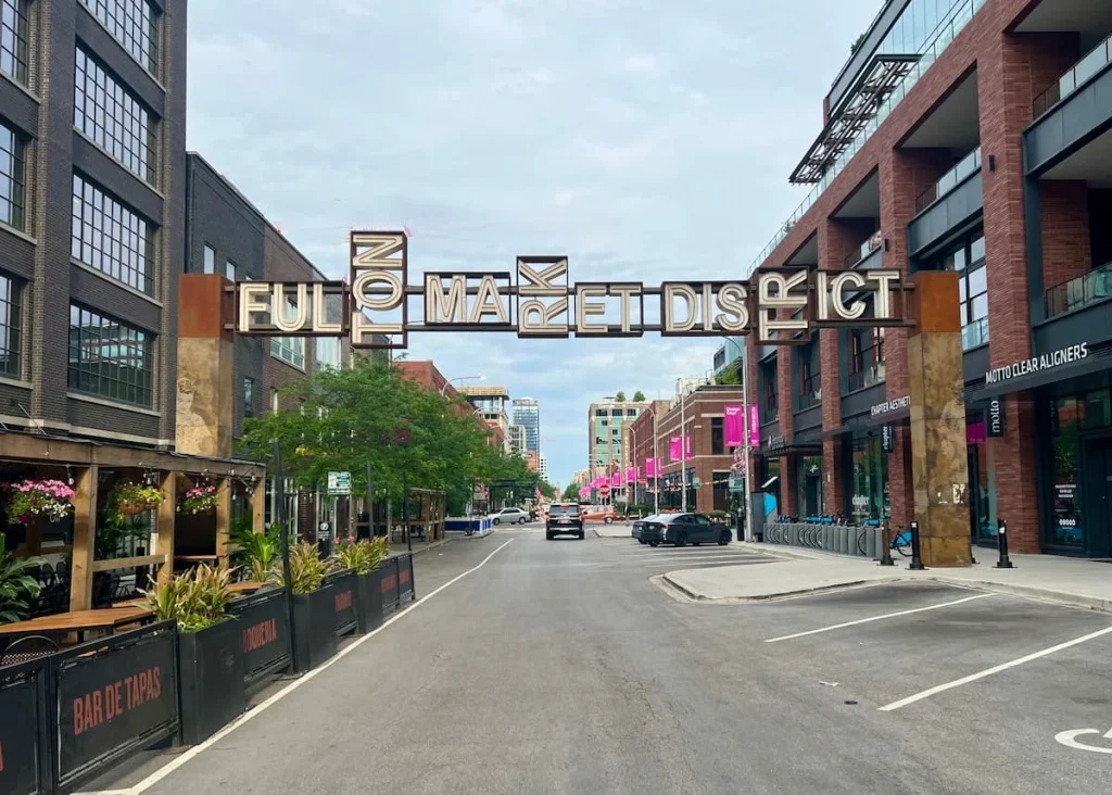 Fulton Market sign with warehouses in the background, Chicago