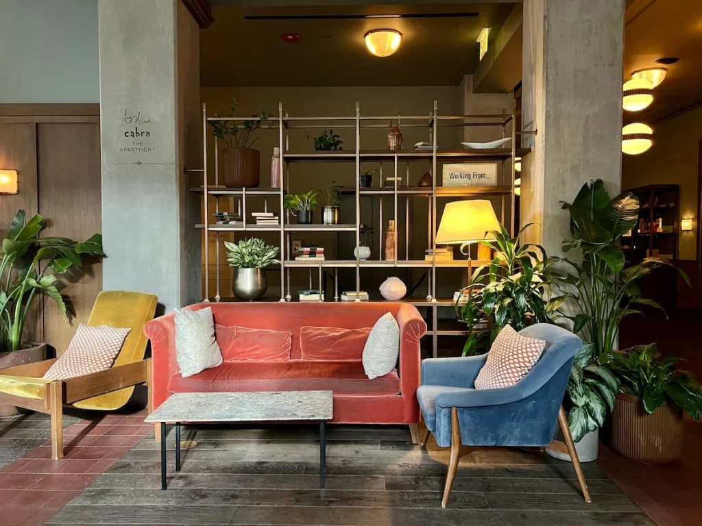 Sofa and armchair in lobby at The Hoxton, Chicago
