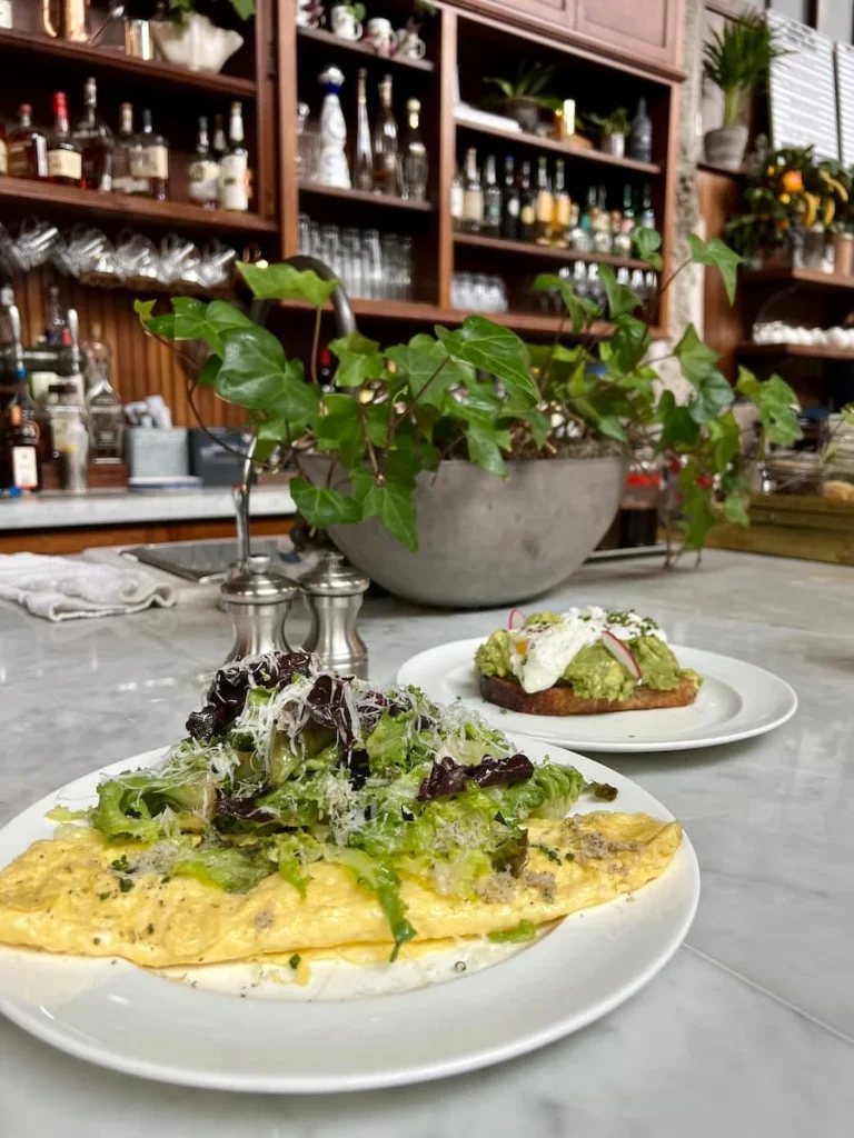 Truffle omelette and avocado on toast with poached eggs at Allis at Soho HOuse, Chicago