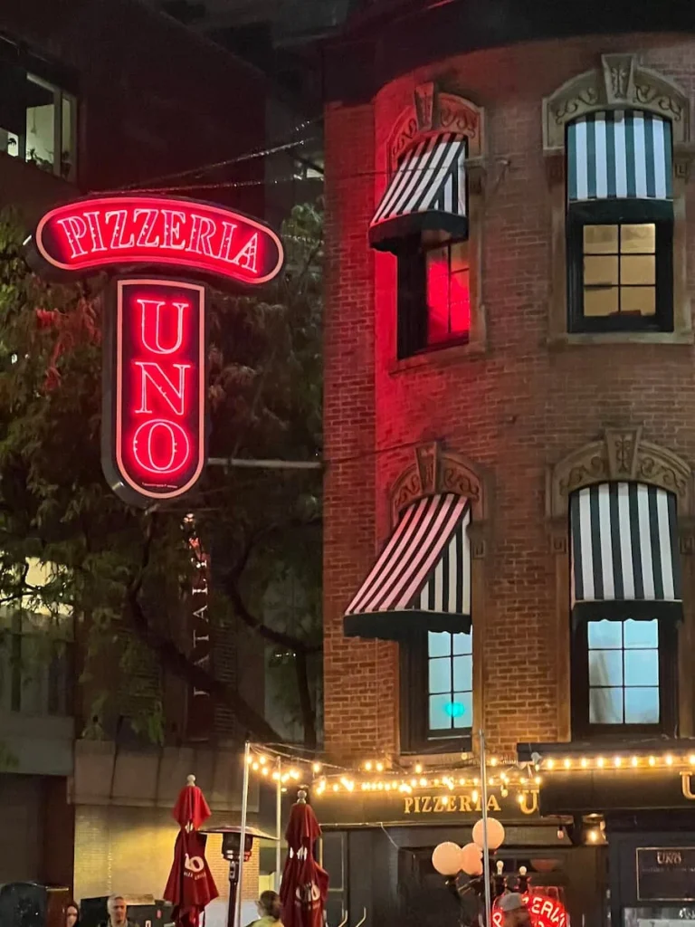 Exterior of Pizzeria Uno, Chicago with lettering in brigh red.