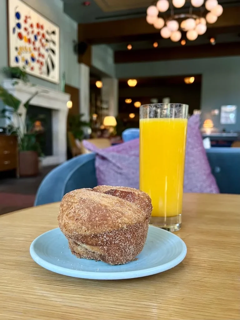 Cinnmaon bun and orange juice at Cira Brunch at The Hoxton, Chicago