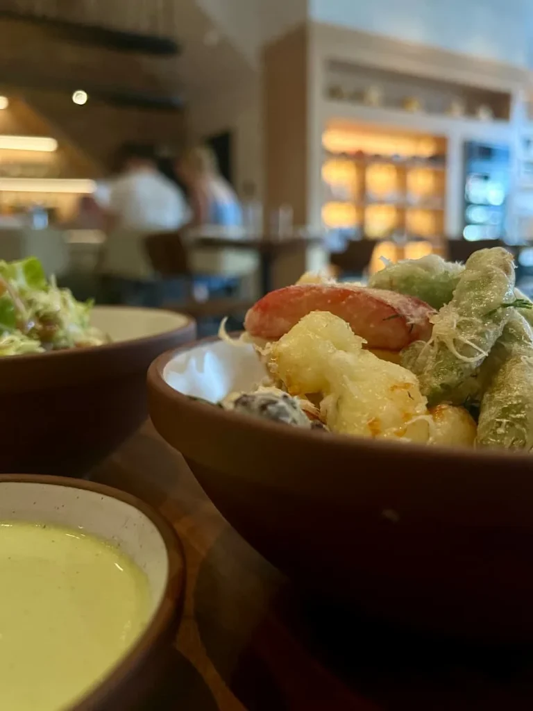 Frito Mitso (cheese curds, tarragon aioli and season veg) and shaved brussel sprouts (with pear pistacchio and rosemary at Daisies, Chicago