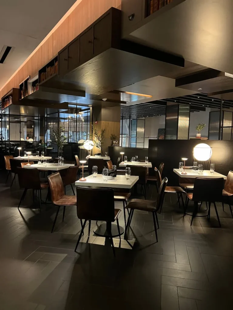 Level 2 lounge area and business centre area with tables at Hotel EMC2, one of the cool and quirky boutique hotels in Chicago