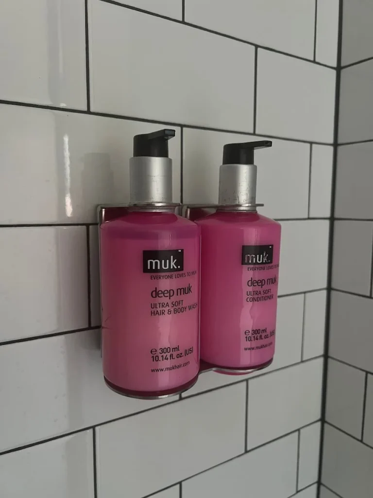 MUK shampoo/bodywash and conditioner at Moxy, Chicago. The bottles are full size and pink on the outside