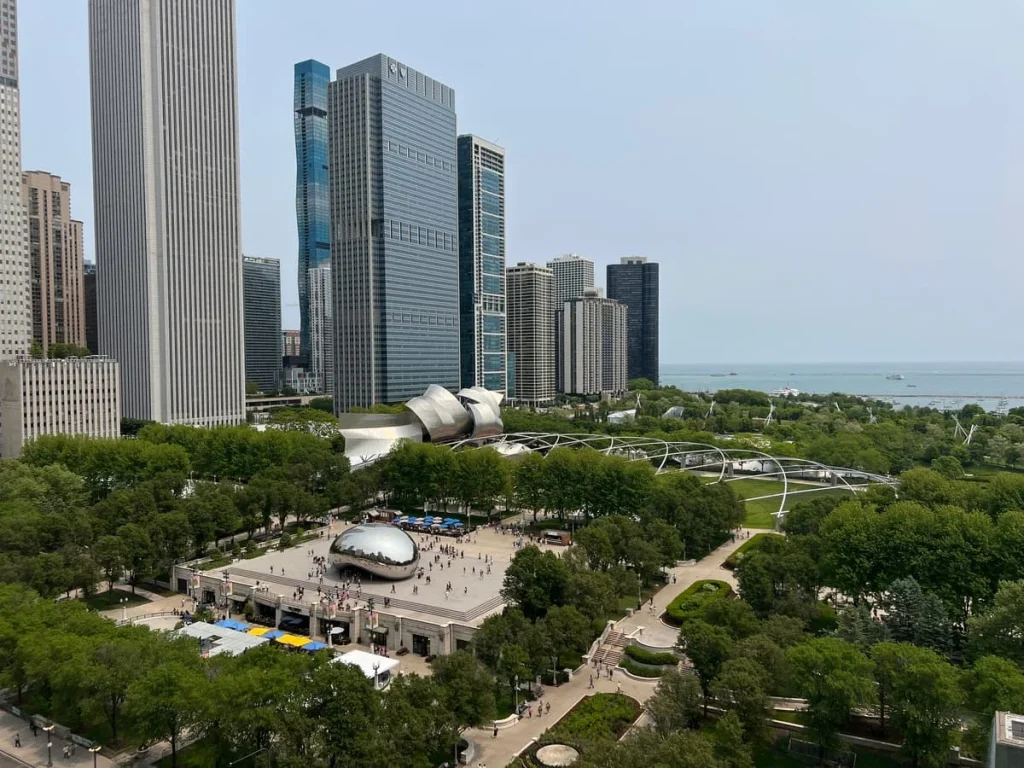 Millennium Park aerial view from Cindy's Rooftop, Chicago. The Bean and lake Michigan are in the background