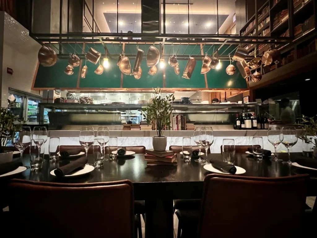 Private dining table all set up at The Albert restaurant at Hotel EMC2, one of the places that serves vegetarian friendly food in Chicago