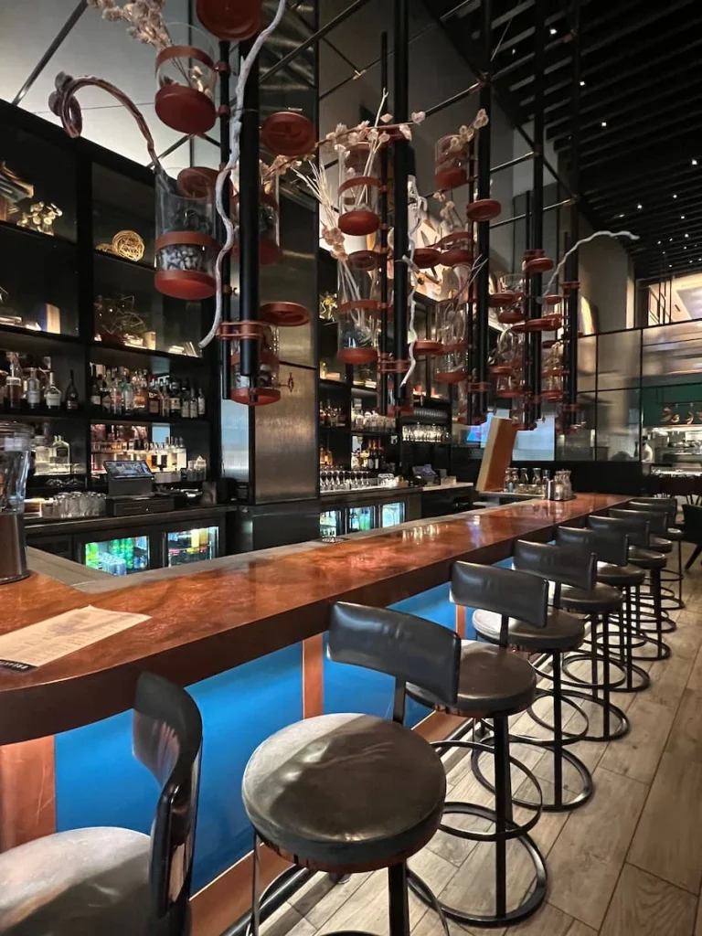 A side vied of the bar at The Albert Restaurant at one of the cool and quirky boutique hotels in Chicago