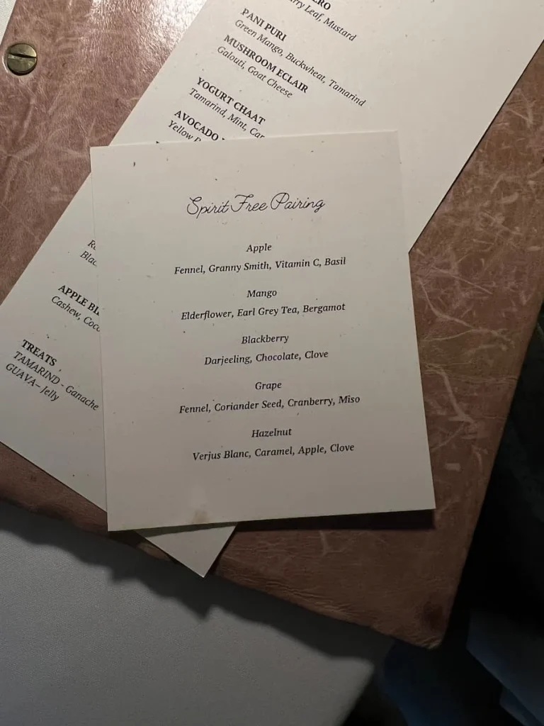 Spirit free drinks menu at Indienne, Chicago on a salmon pink binder