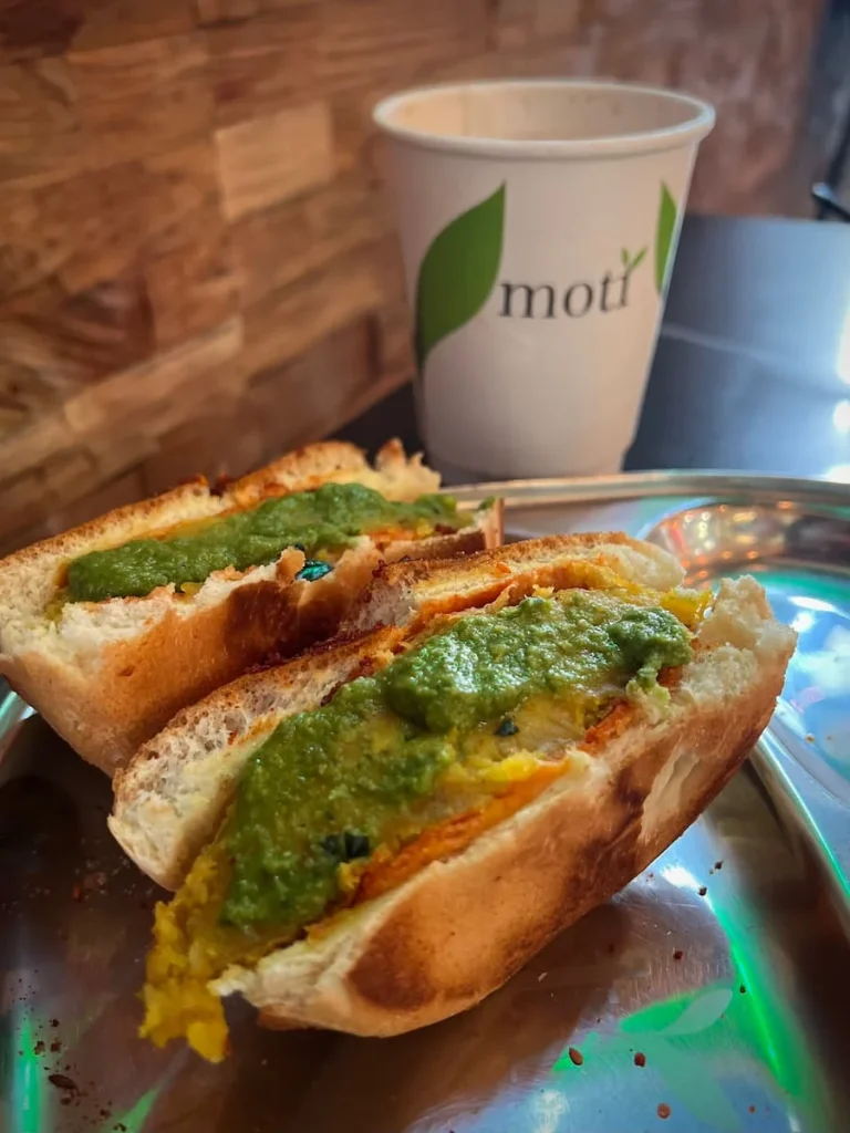Vada Pau with green chutney and masala chai at Mazala Pizza by Moti cafe, Chicago