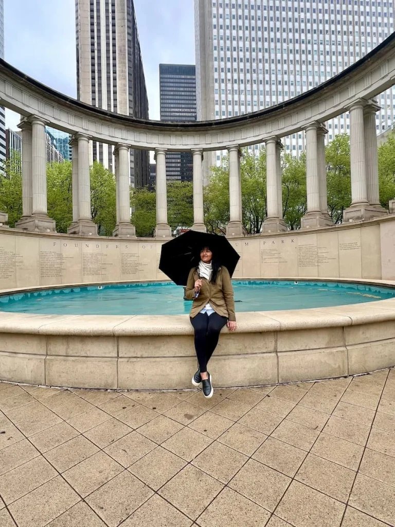 Bejal standing in front of memorial fountain in Millenium Park