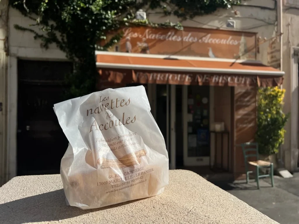 Les navettes des Accoules, storefront with navettes in a bag