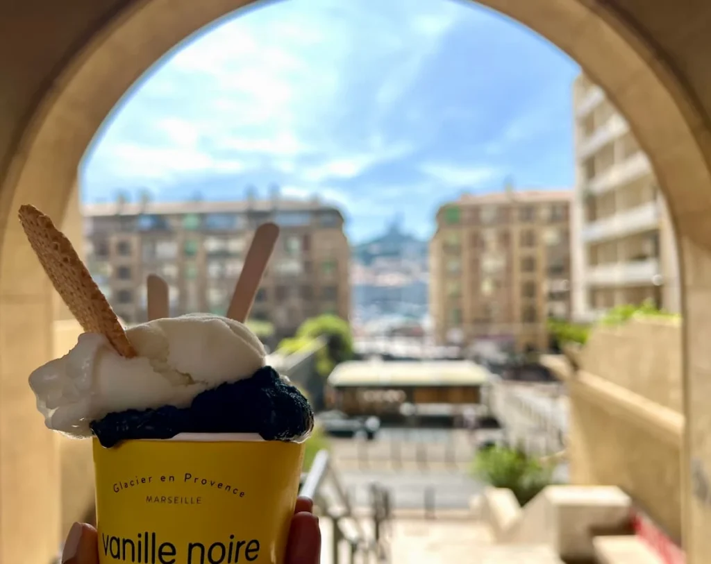 Vanille Noir ice-cream with view of the Vieux Port in the background