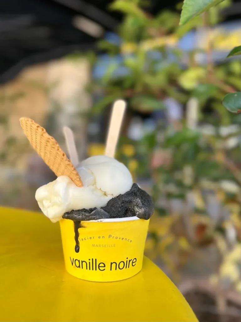 Vanille Noir and Citron ice-creams in a yellow tub at Vanille Noire, Marseille