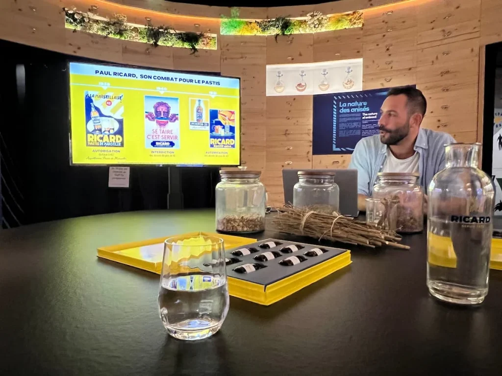 The workshop being given by an amployee at Pastis workshop at MX Maison Yellow, Marseille