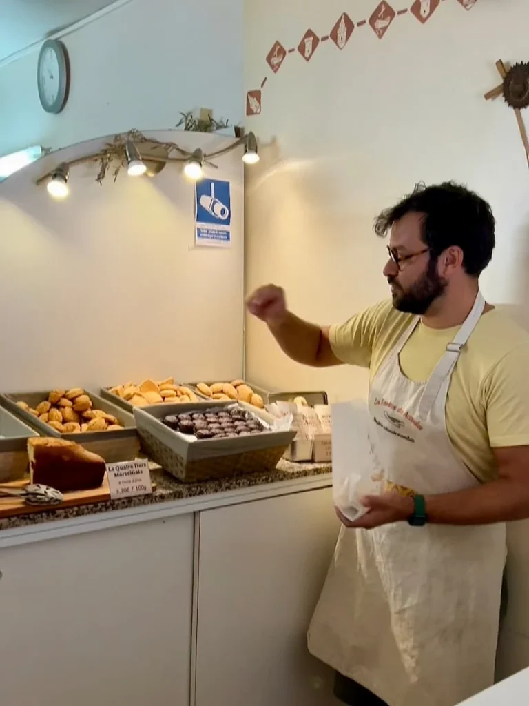 Clement taking us through the process of making the Navettes adn the different types at Les Navettes des Accoules, Marseille