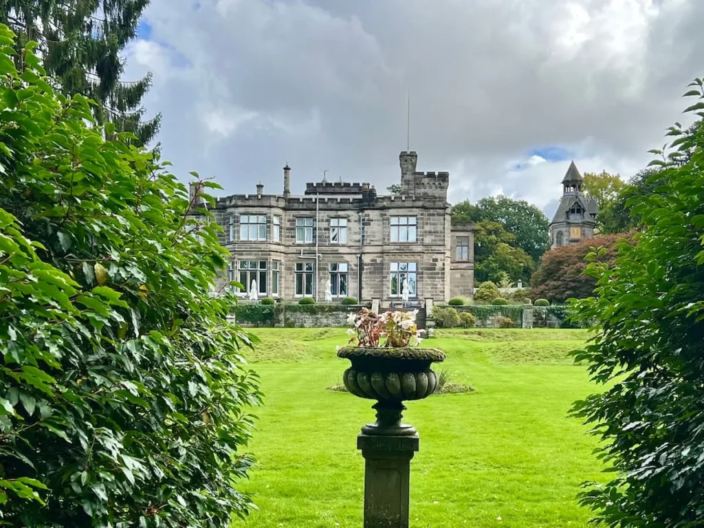 Hampton Manor House exterior from the lawned gardebs