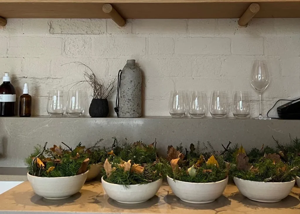 Cookery School kitchen area with bowls of food at Hampton Manor
