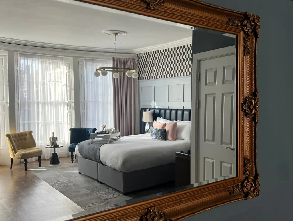 Luxury Boutique Stay at St Martins Lodge Leicester: Reflection of Superior double room with bath in mirror