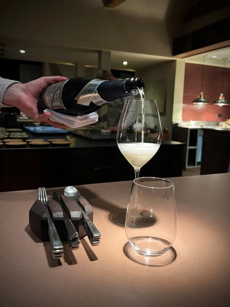 Grace & Savour wine being poured from the taster menu wine pairing, Hampton in Arden