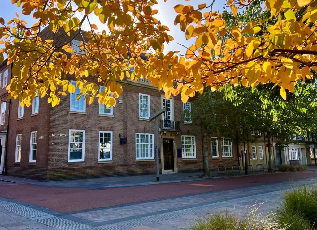 St Martins Lodge, Grade II listed Georgian exterior with autumn foliage, Leicester