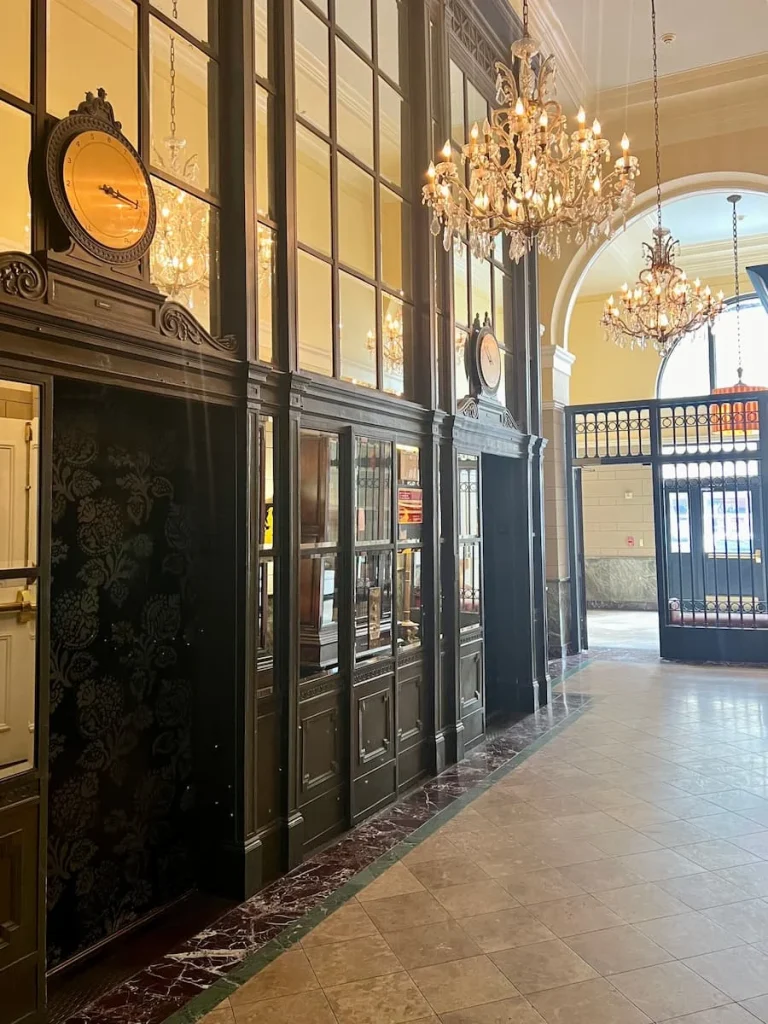 Places to stay in Houston by neighbourhood: Staircase, clocks, lifts and chandelier at Hotel Icon