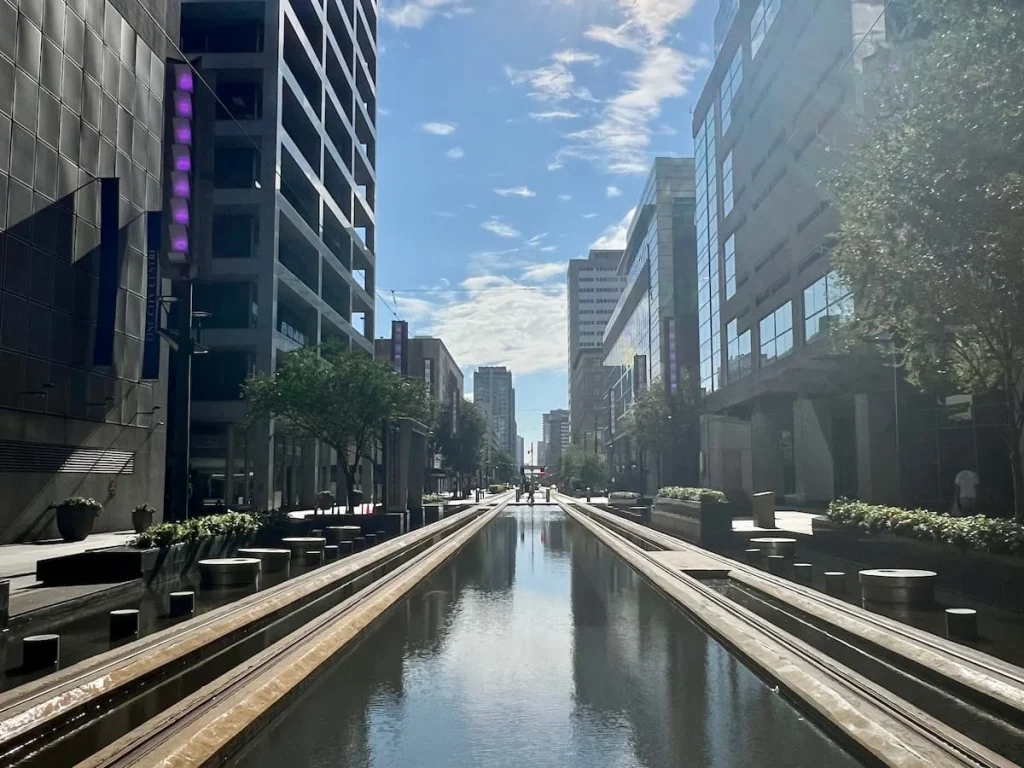 Photo locations in Houston:Main Street Square Reflecting Pool with surrounding skyscrapers