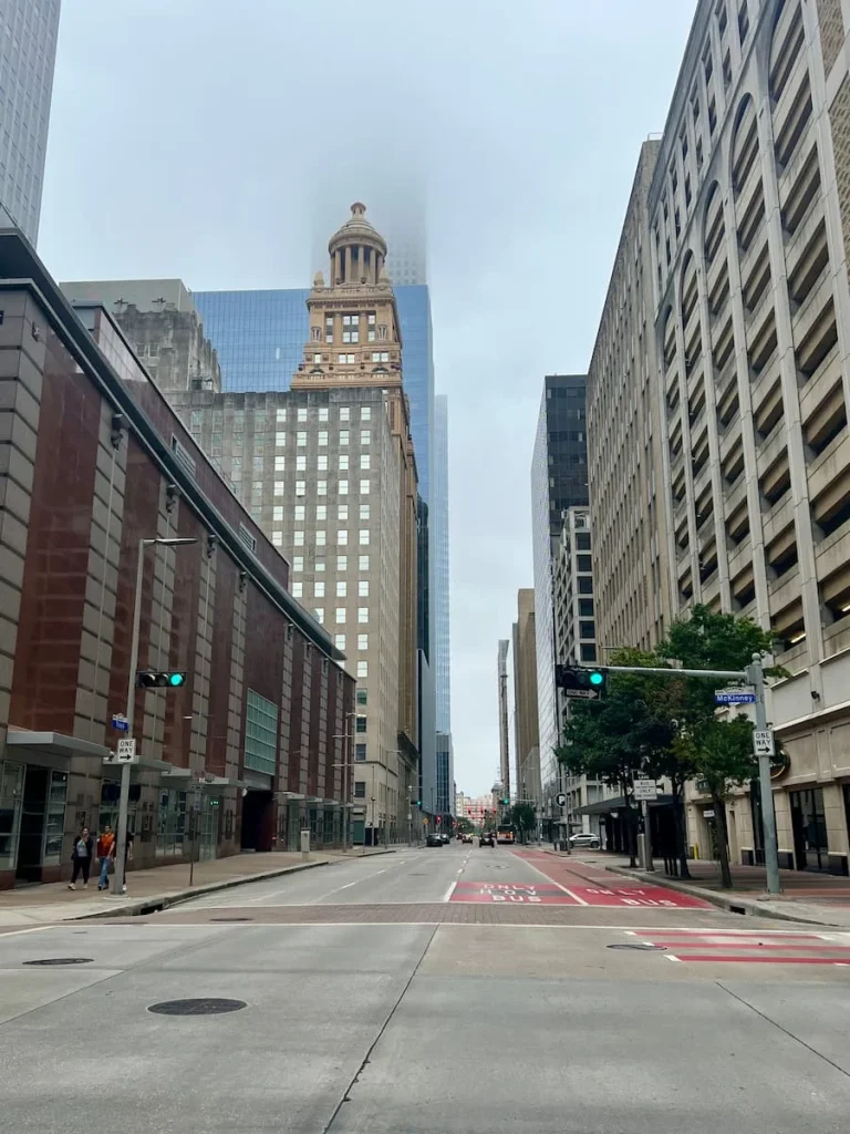 3 days in Houston: Downtown street with skyscrapers on either side