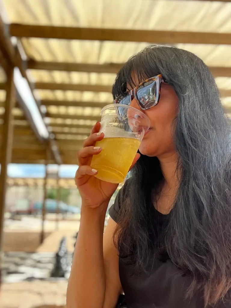 Bejal drinking craft beer at 8th Wonder Brewery